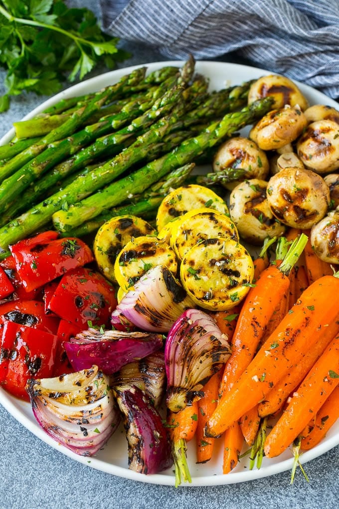 Grilled Vegetables Recipe | Marinated Vegetables | Grilled Veggies #vegetables #veggies #grilling #glutenfree #lowcarb #keto #dinner #sadud #cleaneating #healthy A colorful platter of grilled vegetables flavored with garlic and herbs.