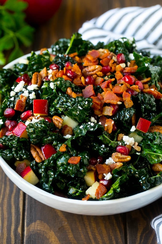 Apple Kale Salad Recipe | Kale Recipe | Fall Salad #kale #apples #bacon #salad #feta #dinner #lunch #sadud Apple kale salad topped with bacon and pecans.