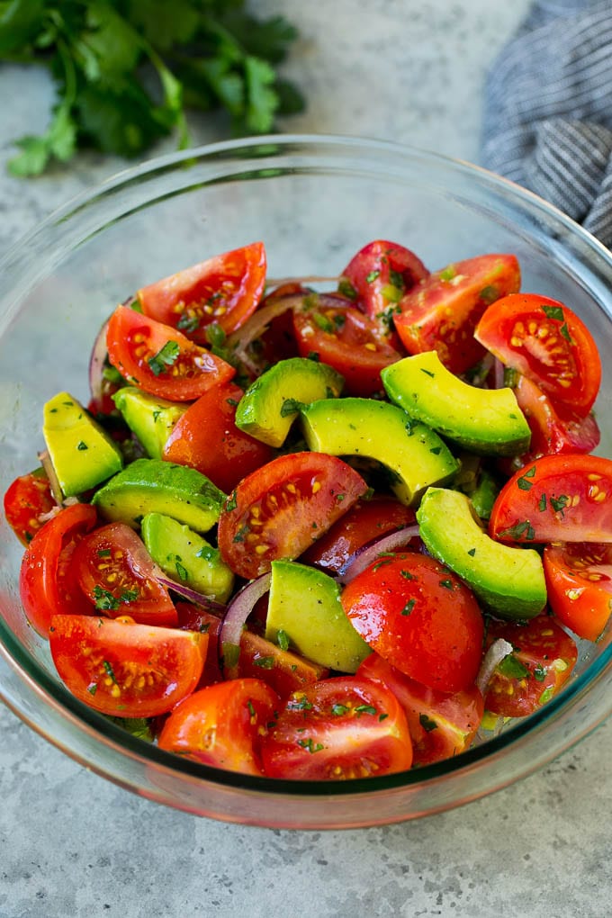 Tomato Avocado Salad Recipe | Avocado Salad | Tomato Salad #salad #tomato #avocado #glutenfree #cleaneating #dinner #sadud #healthy Tomato avocado salad with red onion and a cilantro lime dressing.