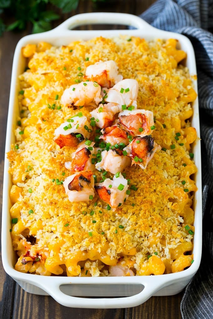 Lobster Mac and Cheese Recipe | Lobster Macaroni and Cheese | Baked Mac and Cheese #pasta #macandcheese #macaroni #lobster #cheese #dinner #sadud A baking dish of lobster macaroni and cheese, garnished with chopped lobster meat.