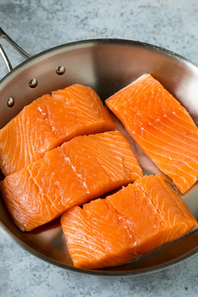 Pan Seared Salmon Recipe | Garlic Butter Salmon | Seared Salmon #salmon #garlic #butter #keto #lowcarb #dinner #sadud Raw salmon fillets in a pan.