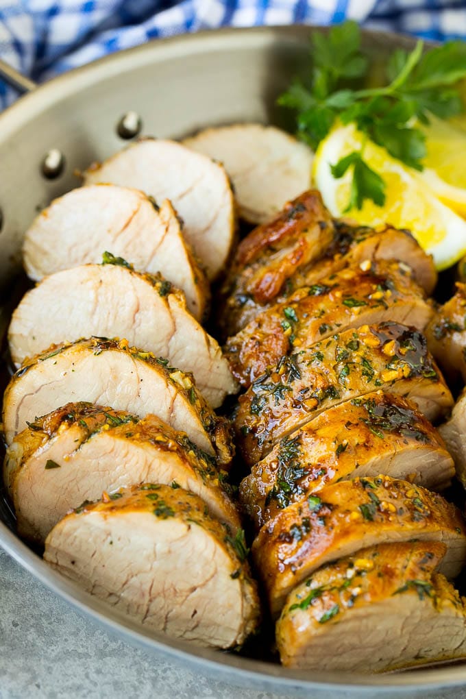 Marinated Pork Tenderloin Recipe | Pork Tenderloin Marinade | Pork Marinade #pork #porktenderloin #marinade #dinner #grilling #sadud Pork tenderloin marinade with sliced cooked pork in a skillet.