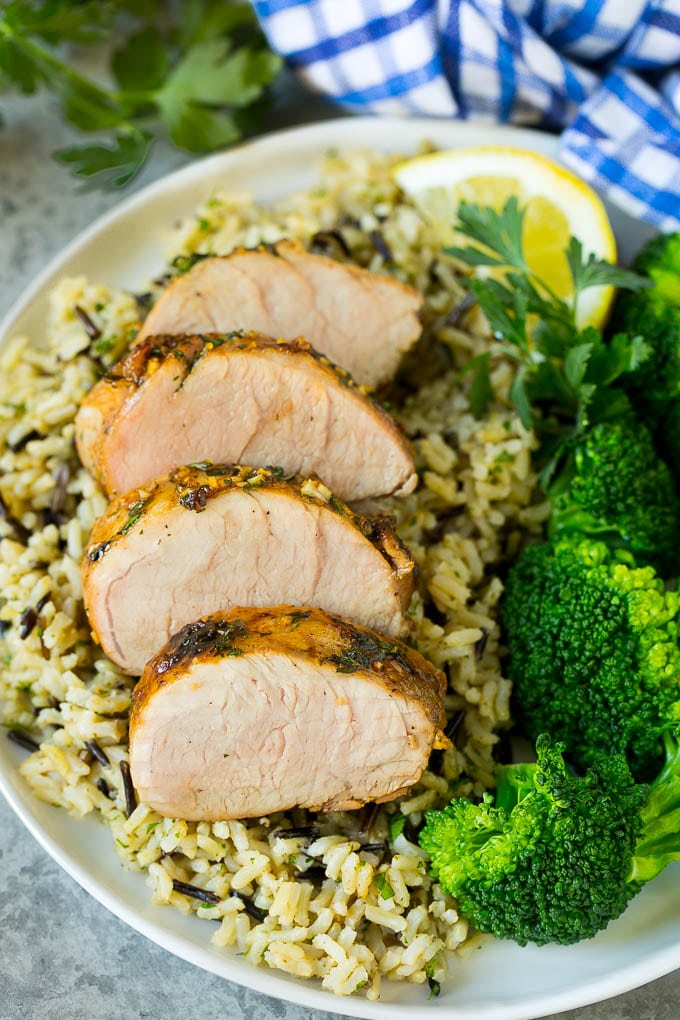 Marinated Pork Tenderloin Recipe | Pork Tenderloin Marinade | Pork Marinade #pork #porktenderloin #marinade #dinner #grilling #sadud Pork tenderloin marinade over sliced pork, served with rice and broccoli.
