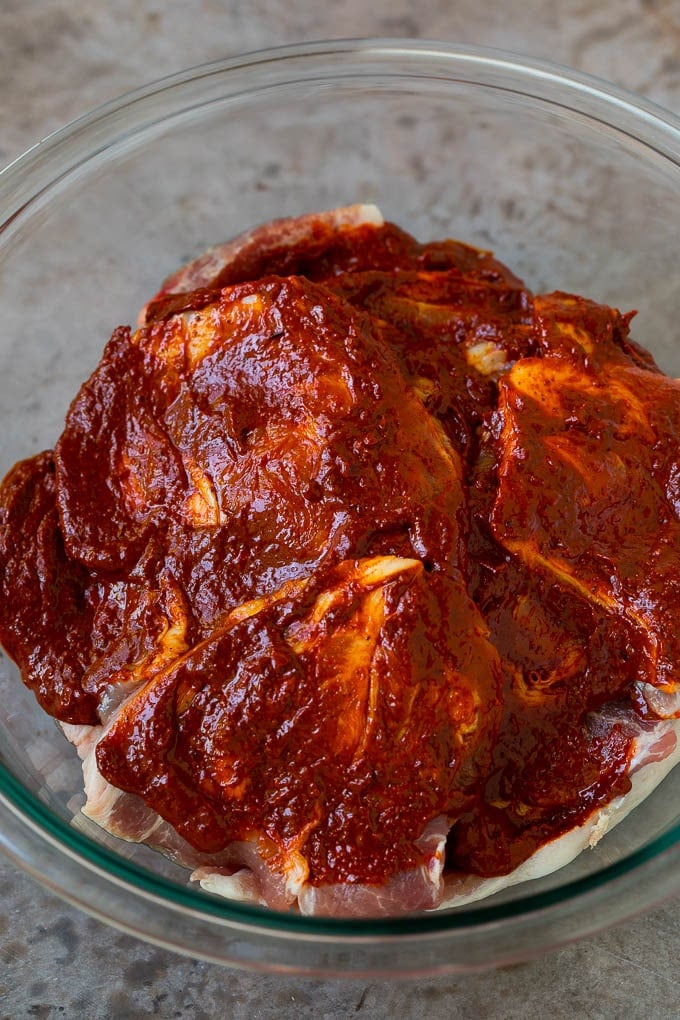Tacos al Pastor Recipe | Pork Tacos | Mexican Tacos #tacos #pork #pineapple #grilling #tacotuesday #dinner #sadud Sliced pork shoulder coated in a chile based marinade.