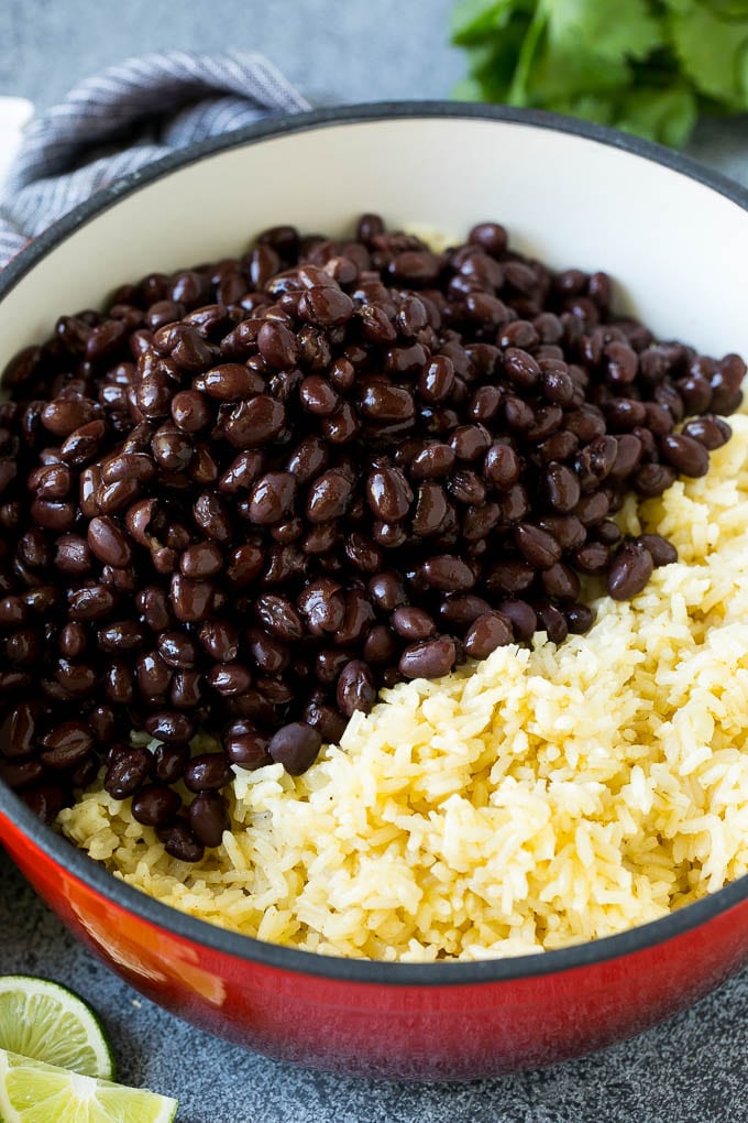 Black Beans and Rice Recipe | Cuban Black Beans | Beans and Rice #beans #rice #blackbeans #sidedish #glutenfree #dinner #sadud Cooked rice and black beans in a pot.
