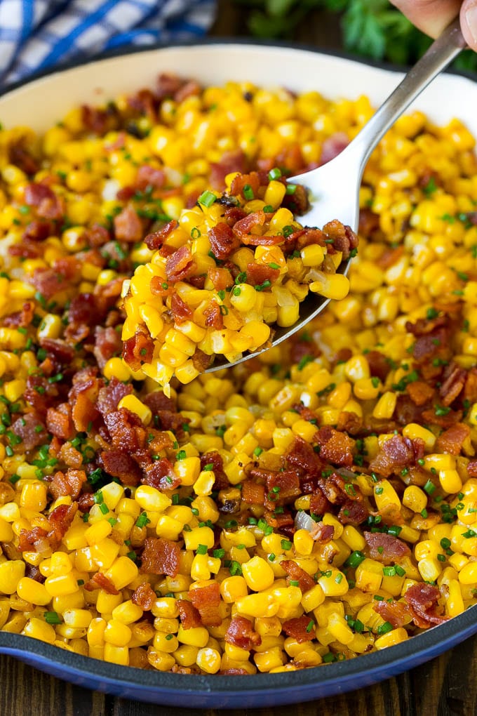 Bacon Fried Corn Recipe | Sauteed Corn | Corn Side Dish #corn #bacon #sidedish #glutenfree #dinner #sadud A spoonful of fried corn made with bacon and onions.