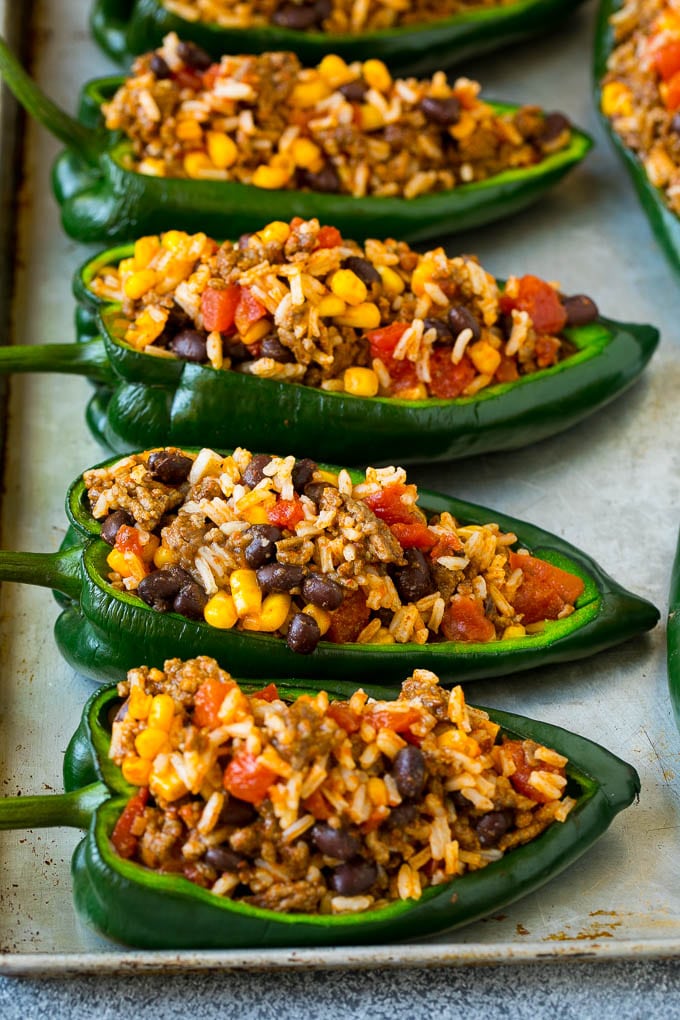 Stuffed Poblano Peppers | Stuffed Peppers | Pasilla Peppers #peppers #stuffedpeppers #beef #rice #beans #corn #dinner #sadud Poblano peppers filled with rice, meat, beans and corn.