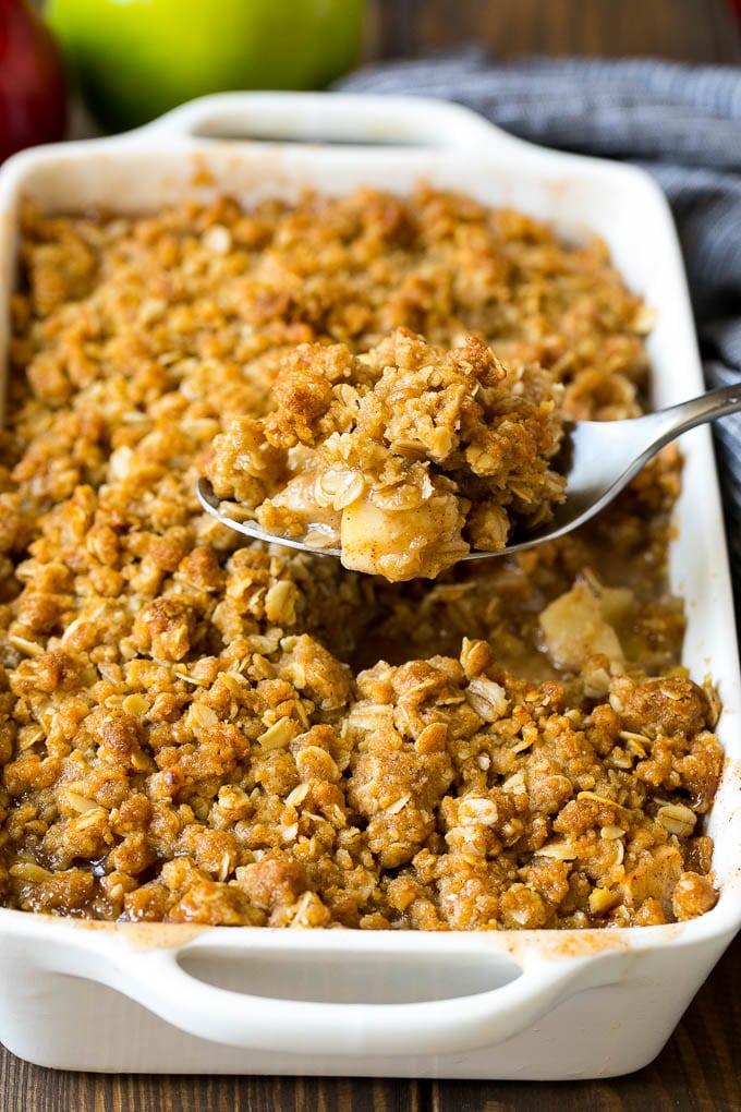 Apple Crisp Recipe | Apple Dessert #apples #dessert #baking #fall #sadud A spoon serving up a portion of apple crisp.