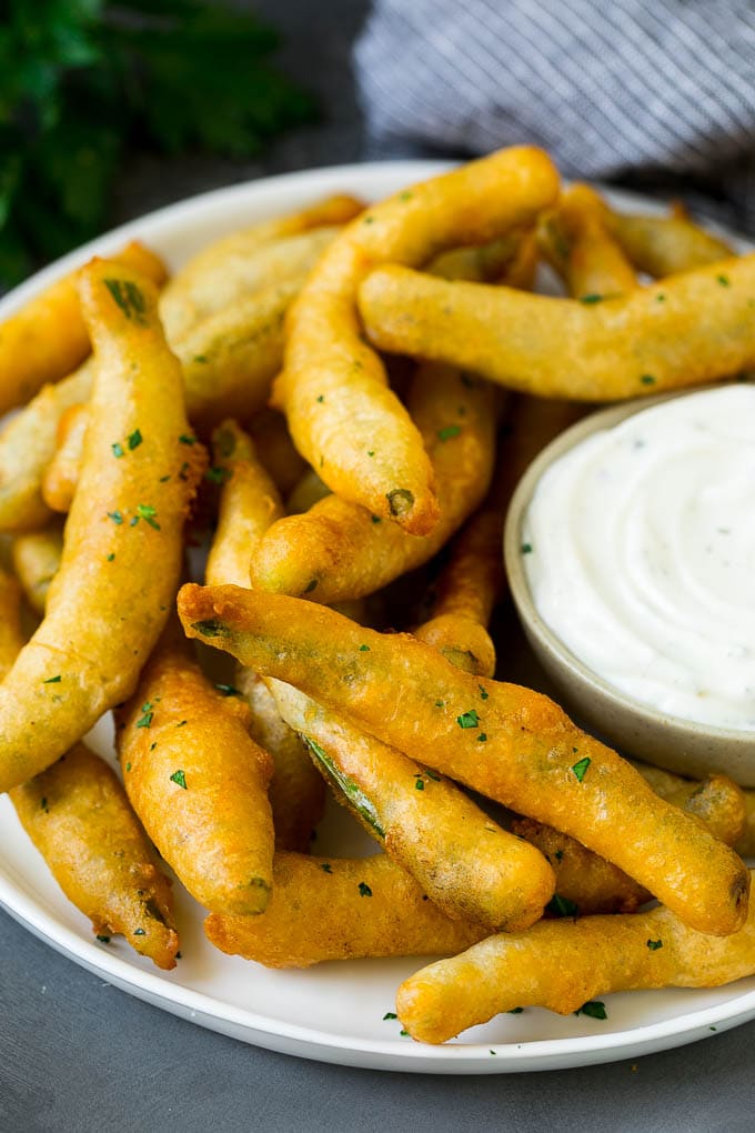 Fried Green Beans Recipe | Green Beans #greenbeans #appetizer #snack #sadud A plate of fried green beans served with ranch dip.