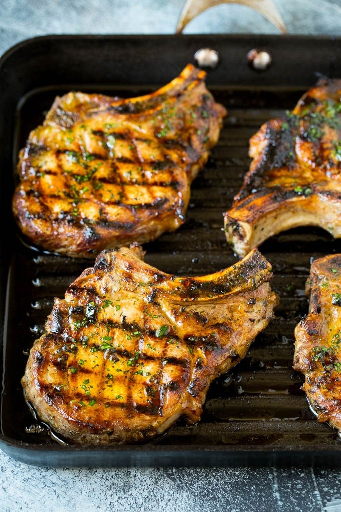 Grilled Pork Chops | Pork Chop Marinade #porkchops #grilling #pork #marinade #dinner #sadud Pork chops on a grill pan.