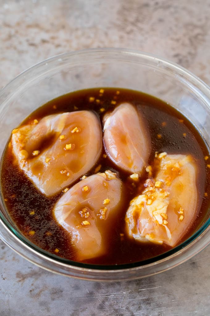 Huli Huli Chicken Recipe | Hawaiian Chicken | Grilled Chicken Thighs #chicken #pineapple #grilling #dinner #sadud Chicken thighs in a bowl of marinade.