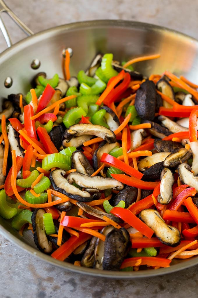Stir Fry Noodles Recipe | Noodle Stir Fry #chicken #noodles #stirfry #mushrooms #dinner #sadud Mushrooms, bell pepper, celery and carrot in a pan.