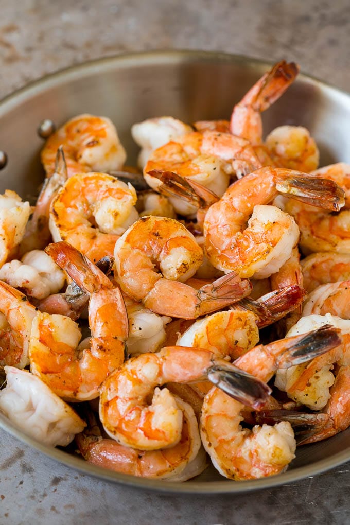 Surf and Turf Recipe | Seared Steak #steak #shrimp #keto #lowcarb #dinner #sadud Sauteed jumbo shrimp in a skillet.