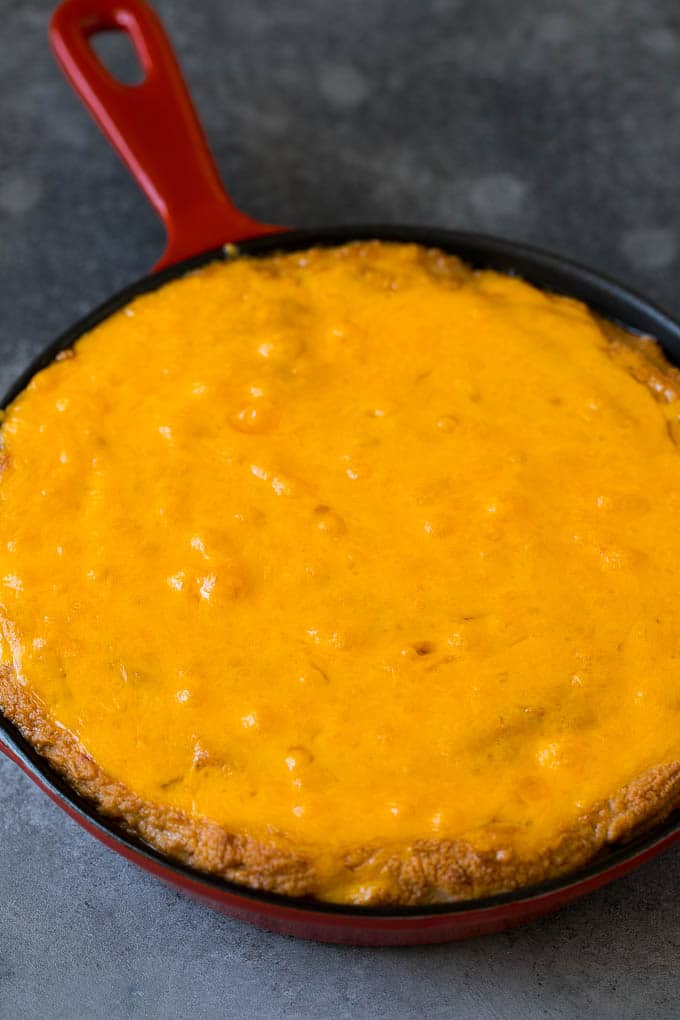 Bean Dip Recipe | Mexican Dip #dip #appetizer #mexicanfood #beans #cheese #sadud Baked refried beans topped with melted cheddar cheese.