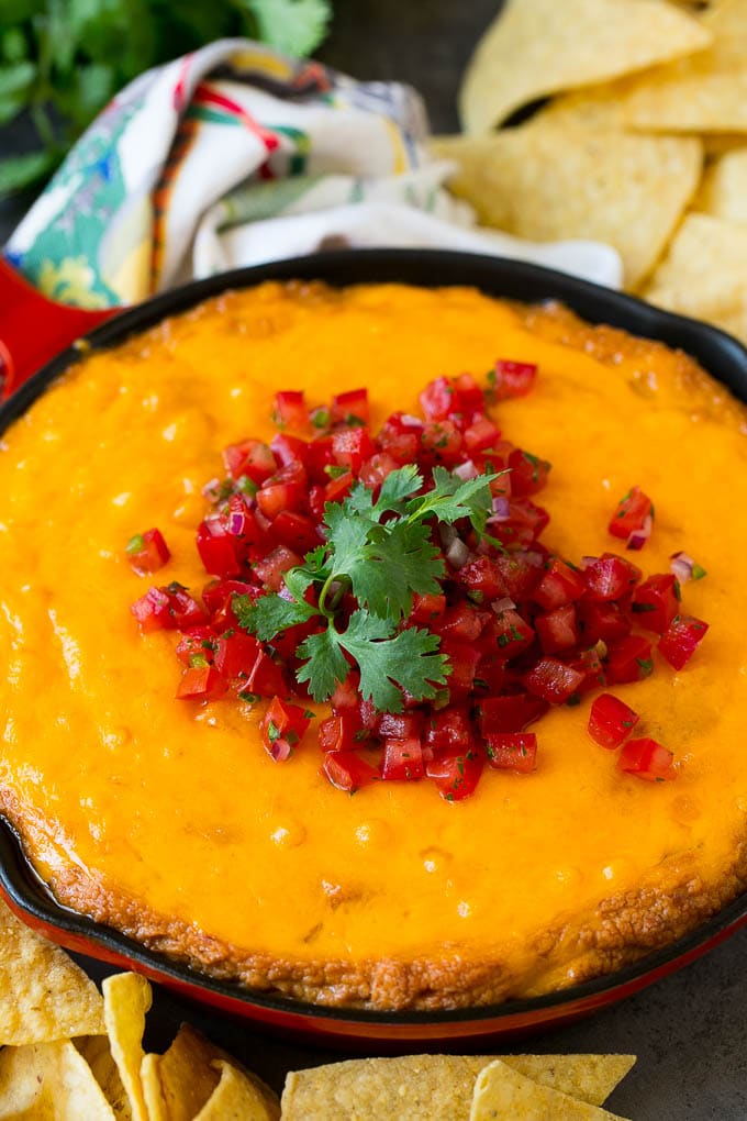 Bean Dip Recipe | Mexican Dip #dip #appetizer #mexicanfood #beans #cheese #sadud Cheesy Mexican bean dip topped with melted cheese and pico de gallo.