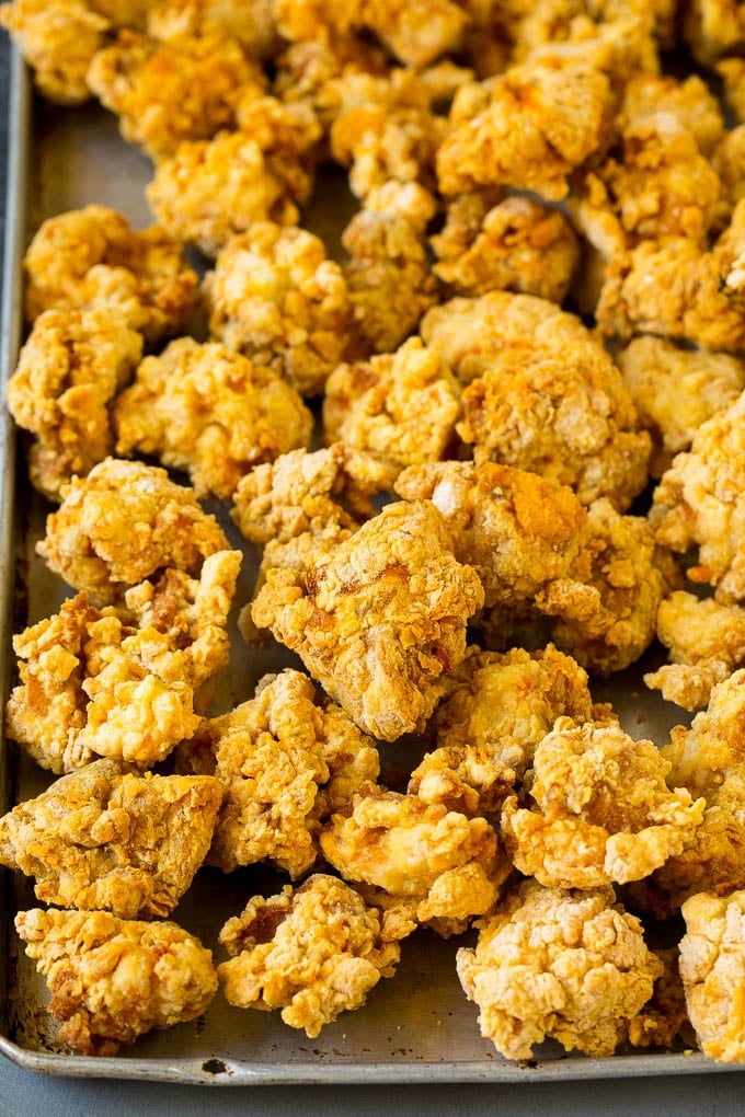 General Tso's Chicken Recipe #chicken #asianfood #dinner #sadud #copycatrecipe Breaded and fried chicken thigh pieces.