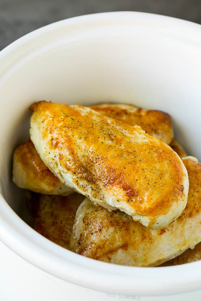 Slow Cooker Chicken Breast Recipe | Crock Pot Chicken Breast | Chicken and Gravy #chicken #slowcooker #crockpot #gravy #dinner #sadud Seared chicken breasts in a crock pot.