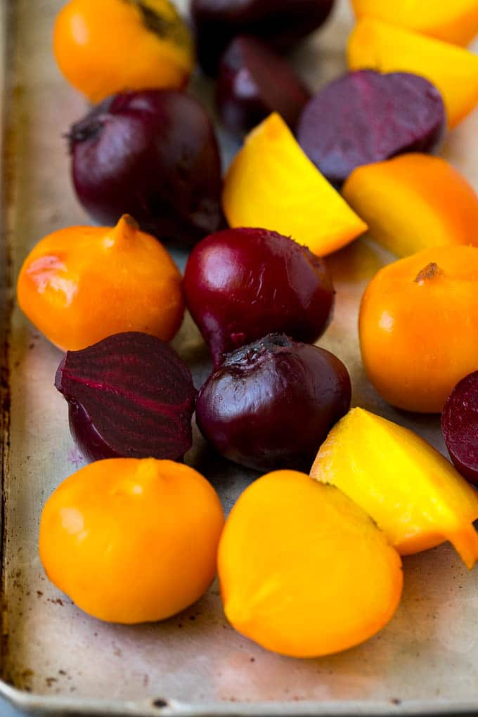 Beet Salad Recipe #beets #avocado #feta #salad #dinner #sadud Roasted red and yellow beets on a sheet pan.