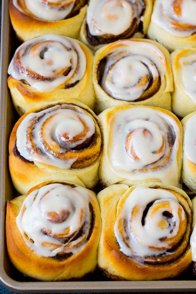Cinnamon Rolls Recipe | Cinnamon Buns #cinnamon #rolls #pastry #breakfast #brunch #sweets #sadud #baking #bread A tray of frosted cinnamon rolls.