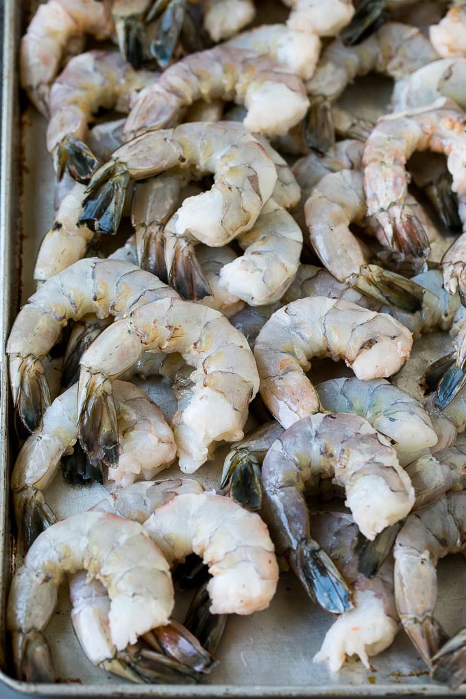 Fried Shrimp Recipe #shrimp #seafood #dinner #appetizer #sadud Raw shrimp on a sheet pan.