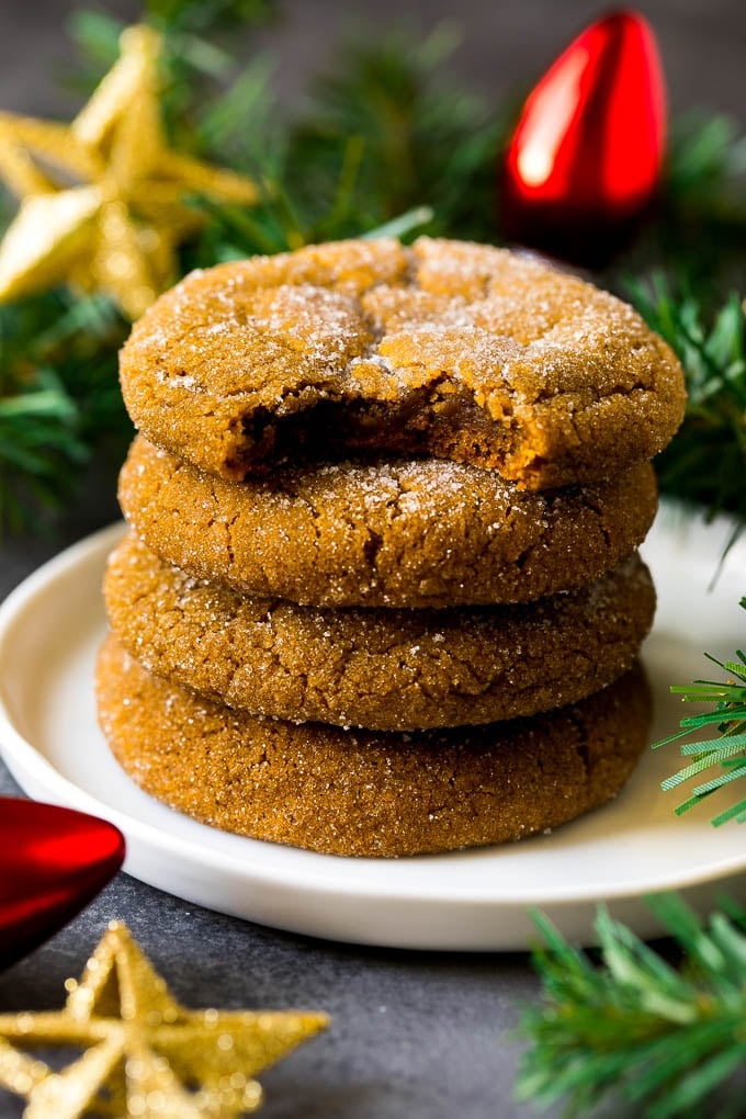 Molasses Cookies Recipe | Spice Cookies #cookies #baking #christmas #dessert #sadud A stack of molasses cookies with a bite taken out of one.