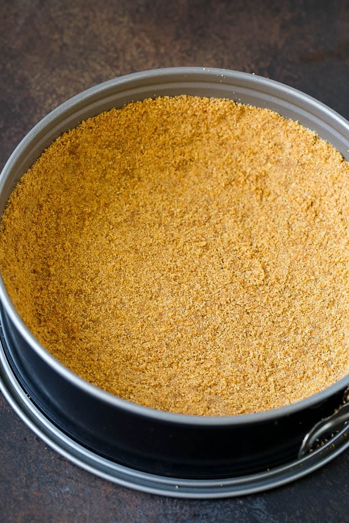 Pumpkin Pie Cheesecake Recipe | Pumpkin Cheesecake #cake #cheesecake #pumpkin #fall #thanksgiving #dessert #sadud Graham cracker crust in a springform pan.