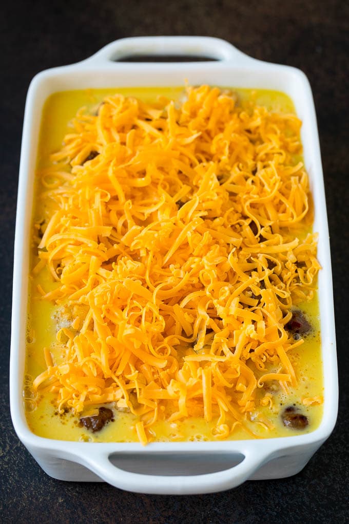 Sausage Egg Casserole Recipe | Egg Casserole #eggs #sausage #potato #cheese #casserole #breakfast #brunch #sadud An unbaked egg casserole ready to go into the oven.