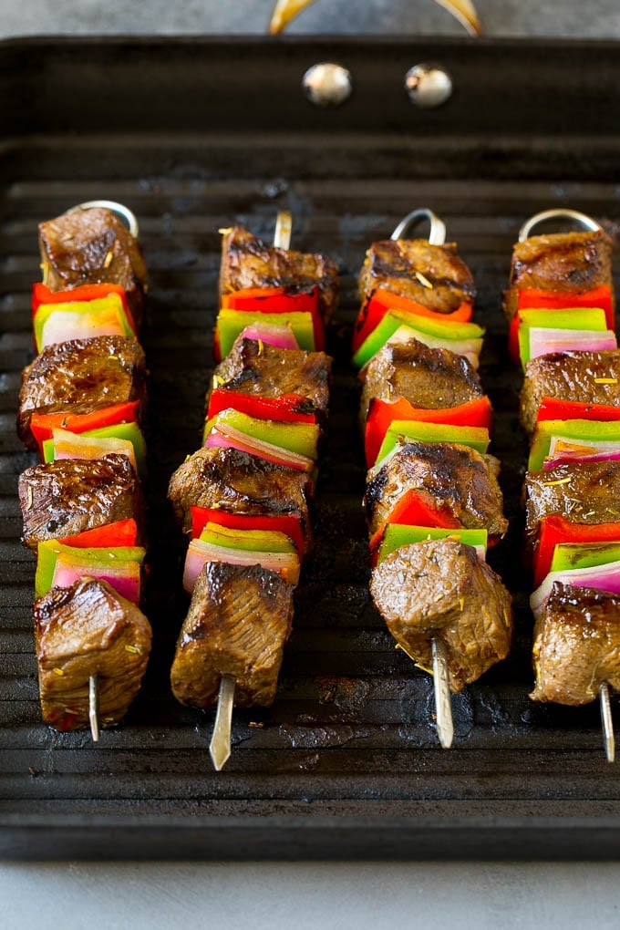 Beef Shish Kabobs Recipe | Beef Kabobs #grilling #beef #steak #dinner #sadud #peppers Beef skewers cooking on a grill pan.