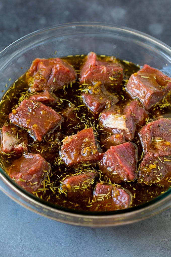 Beef Shish Kabobs Recipe | Beef Kabobs #grilling #beef #steak #dinner #sadud #peppers Steak cubes in a bowl of marinade.