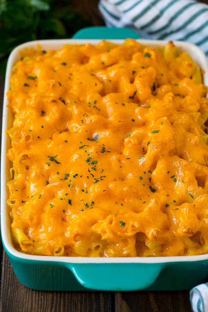 Southern Mac and Cheese | Baked Macaroni and Cheese #pasta #macandcheese #dinner #comfortfood #cheese #sadud Southern mac and cheese topped with melted cheddar and parsley.