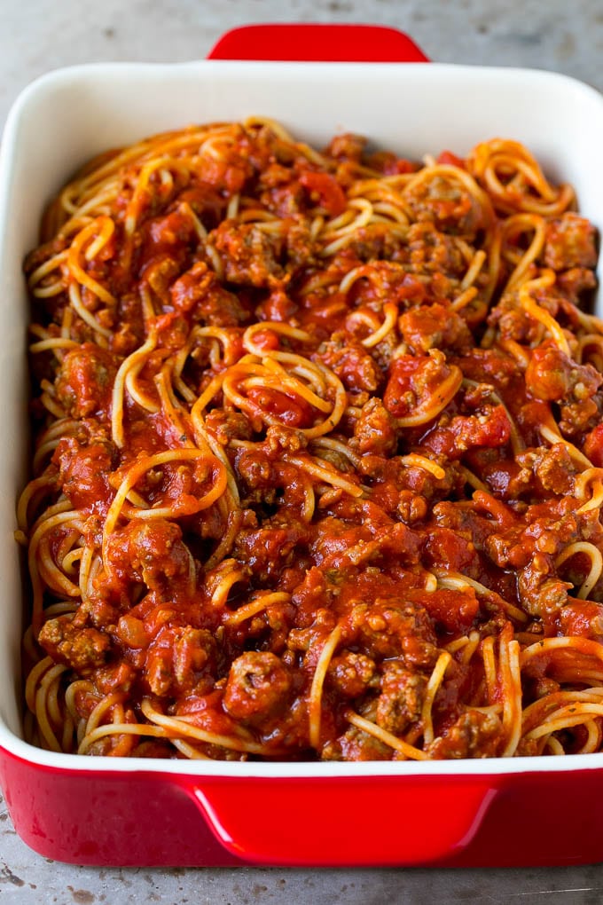 Baked Spaghetti Recipe | Baked Pasta #spaghetti #pasta #cheese #casserole #beef #sausage #dinner #sadud Pasta tossed with meat sauce in a dish.