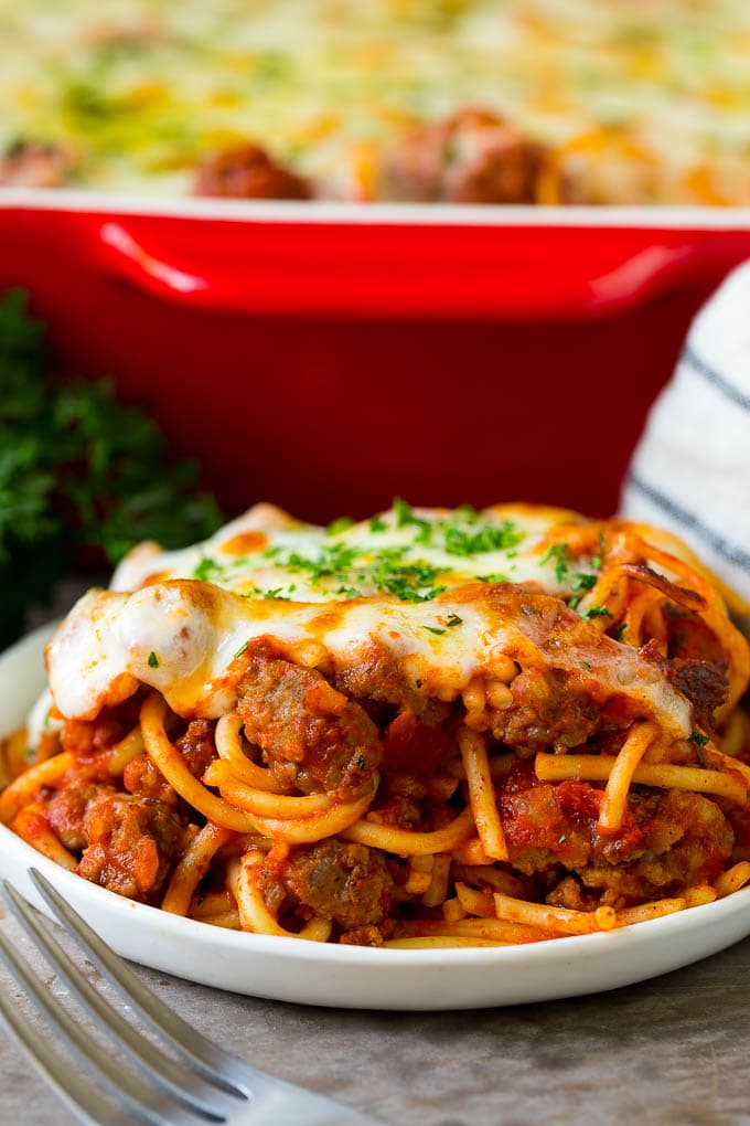 Baked Spaghetti Recipe | Baked Pasta #spaghetti #pasta #cheese #casserole #beef #sausage #dinner #sadud A serving of baked spaghetti topped with melted cheese.