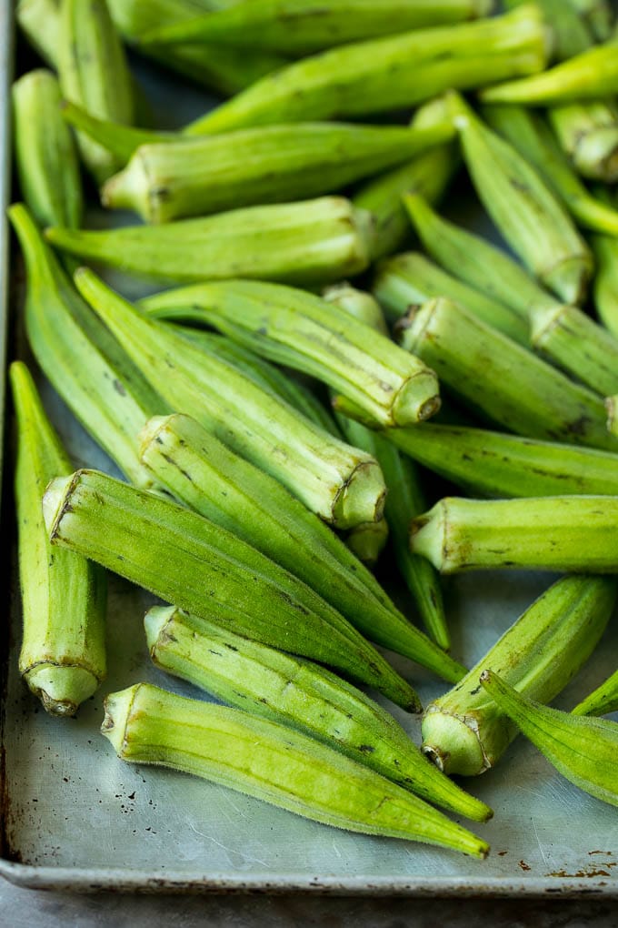 Fried Okra Recipe #okra #appetizer #sidedish #sadud Okra pods on a sheet pan.