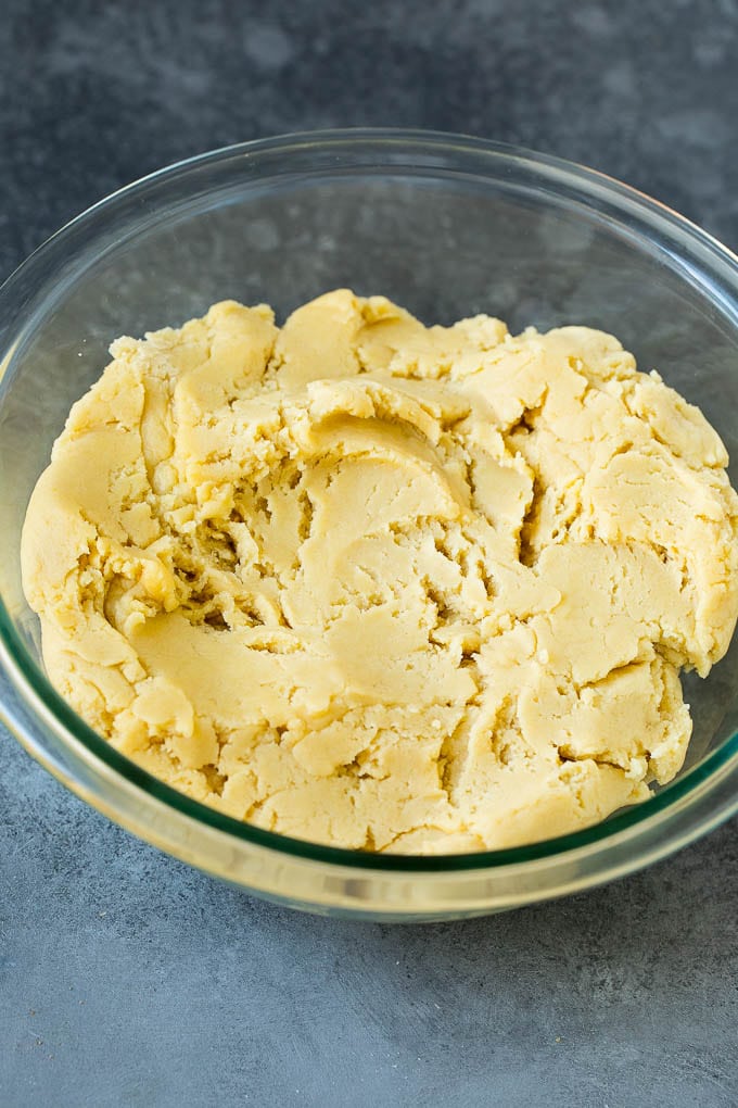 Italian Cookies Recipe | Almond Cookies #cookies #italianfood #frosting #sprinkles #baking #christmas #sadud Almond cookie dough in a mixing bowl.