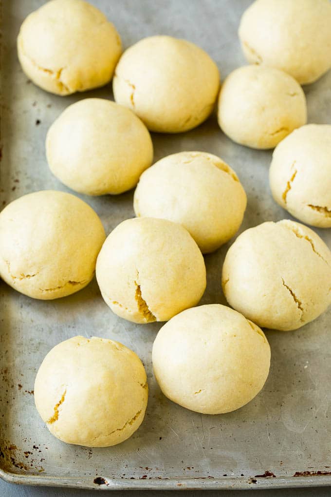 Italian Cookies Recipe | Almond Cookies #cookies #italianfood #frosting #sprinkles #baking #christmas #sadud Baked almond cookies on a baking sheet.