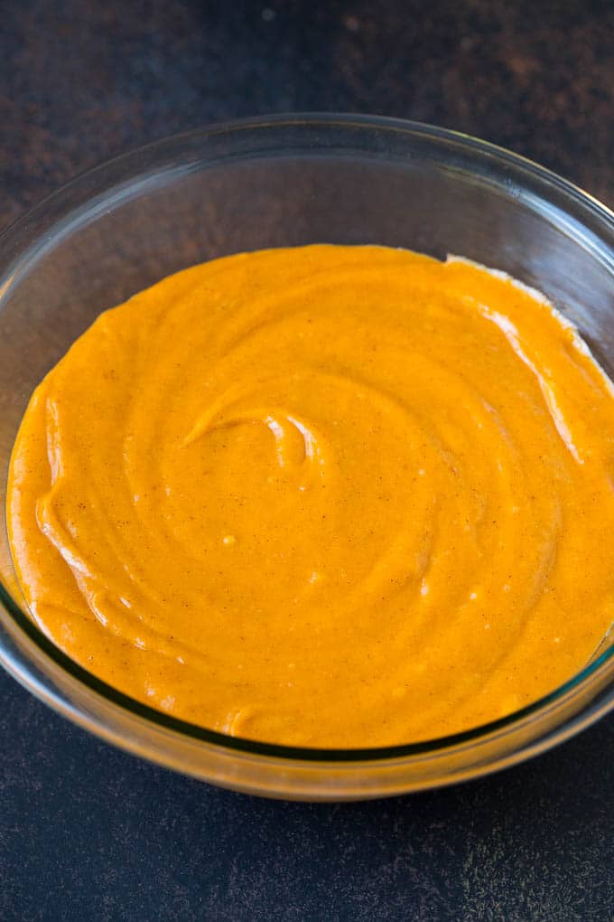 Pumpkin Cupcakes Recipe | Pumpkin Cake #cake #cupcakes #pumpkin #frosting #baking #fall #thanksgiving #sadud A bowl of batter.