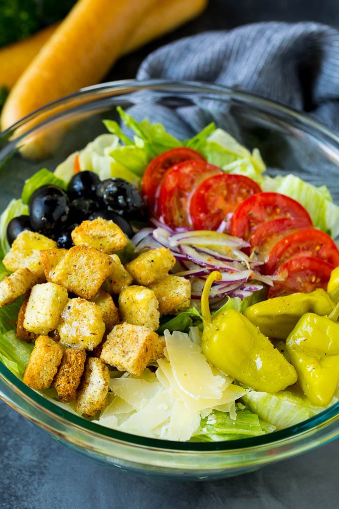 Olive Garden Salad Recipe | Italian Salad #salad #lettuce #olives #sidedish #dinner #sadud Olive Garden salad with tomatoes, croutons, cheese and olives.
