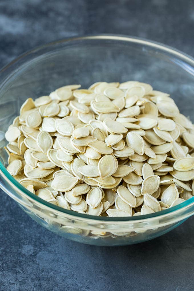 These roasted pumpkin seeds are coated in butter and seasonings, then baked until golden brown. Cleaned seeds.