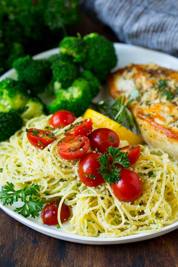 Garlic and Herb Angel Hair Pasta #pasta #garlic #sidedish #dinner #sadud Angel hair pasta served with chicken and broccoli.
