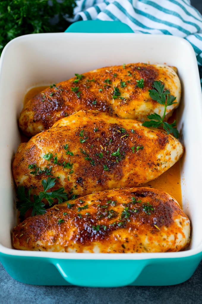 Baked Chicken Breast Recipe #chicken #dinner #sadud Baked chicken breast topped with fresh chopped parsley.