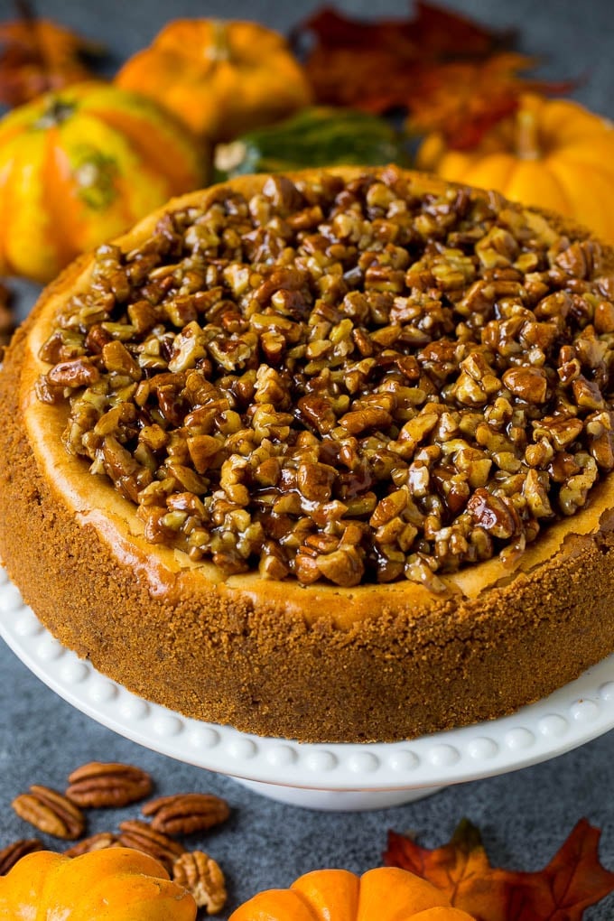 This pecan pie cheesecake is a creamy brown sugar cheesecake topped with a rich and decadent pecan sauce. A pecan pie cheesecake topped with a gooey brown sugar glaze.