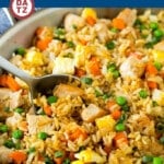 This chicken fried rice is tender seasoned chicken breast pieces stir fried with scrambled eggs, vegetables and white rice.