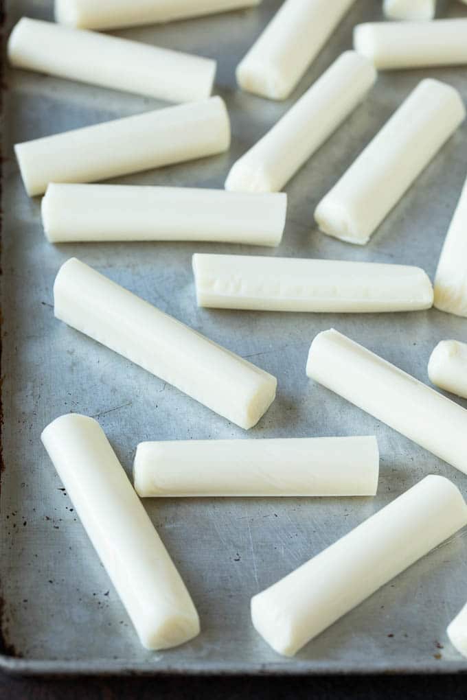Mozzarella Sticks Recipe #cheese #appetizer #sadud Cheese sticks on a sheet pan.