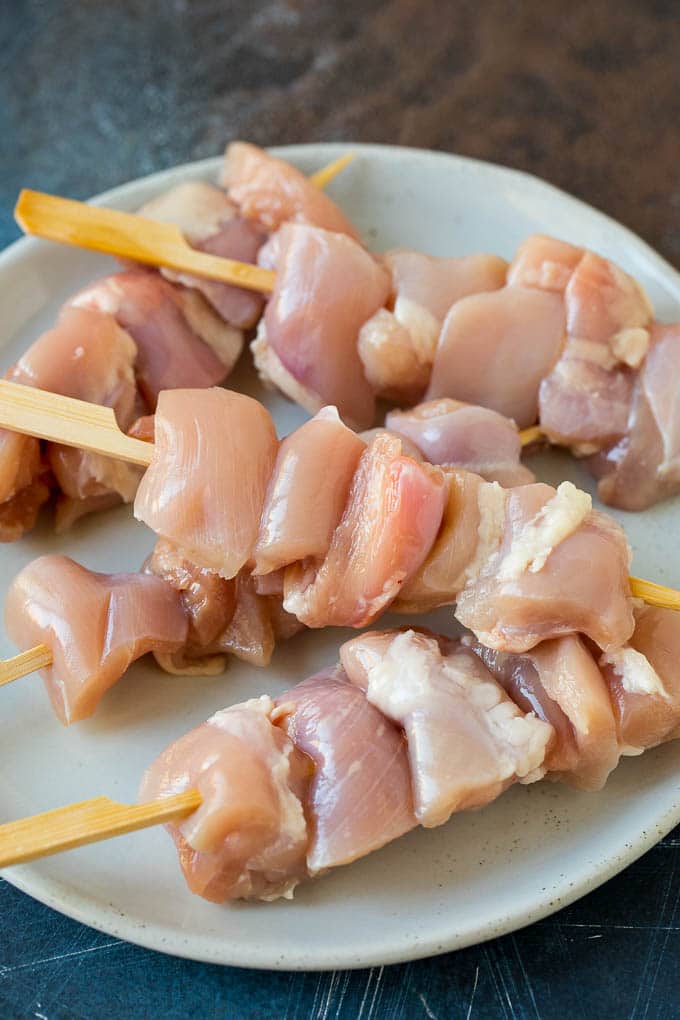 Chicken Yakitori Recipe | Grilled Chicken #chicken #grilling #dinner #sadud Raw chicken threaded onto skewers.
