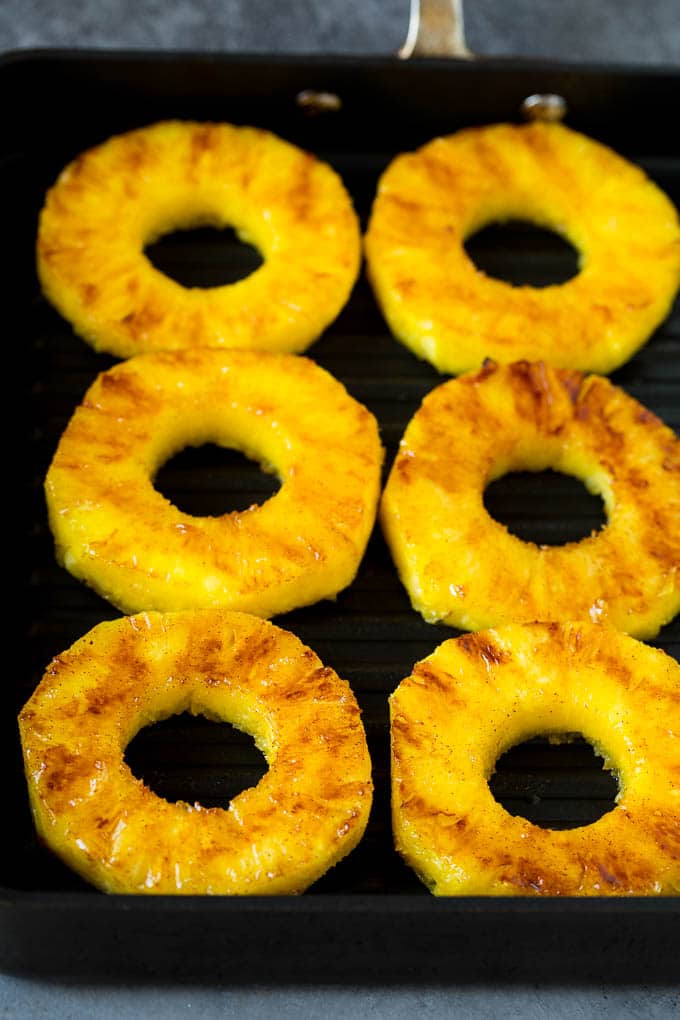 Brown sugar grilled pineapple is a quick and easy side dish or dessert! Cooked pineapple on a grill pan.