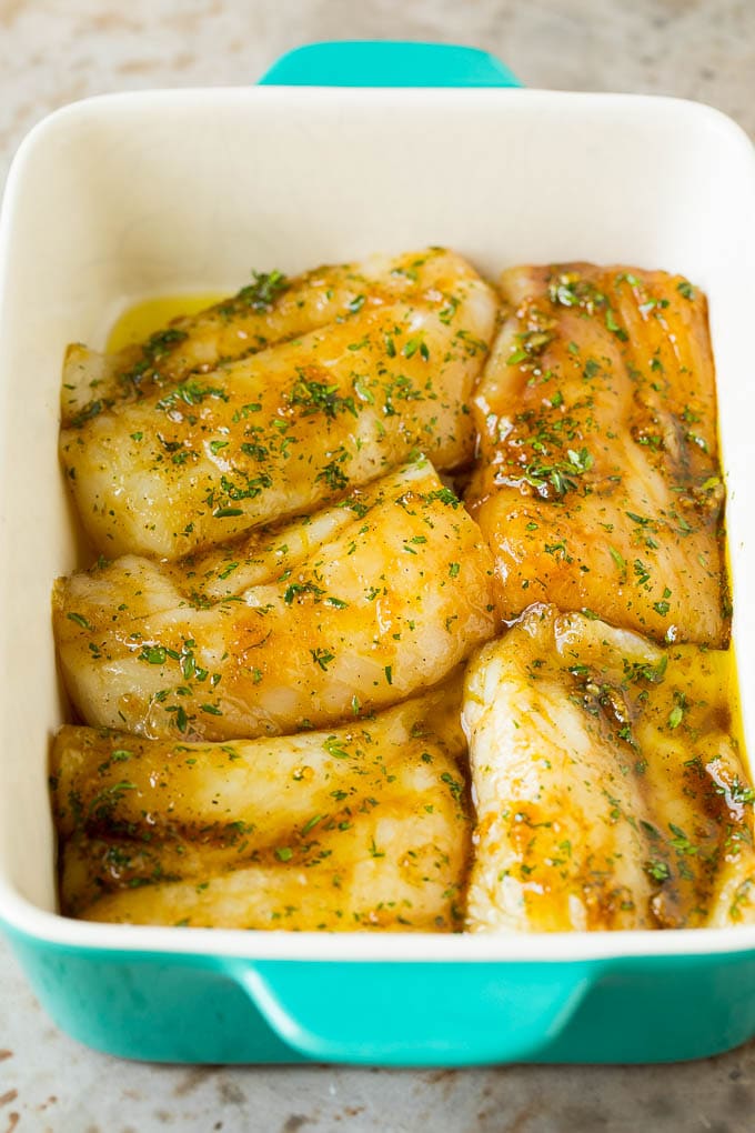 Marinated fish in a baking fish.