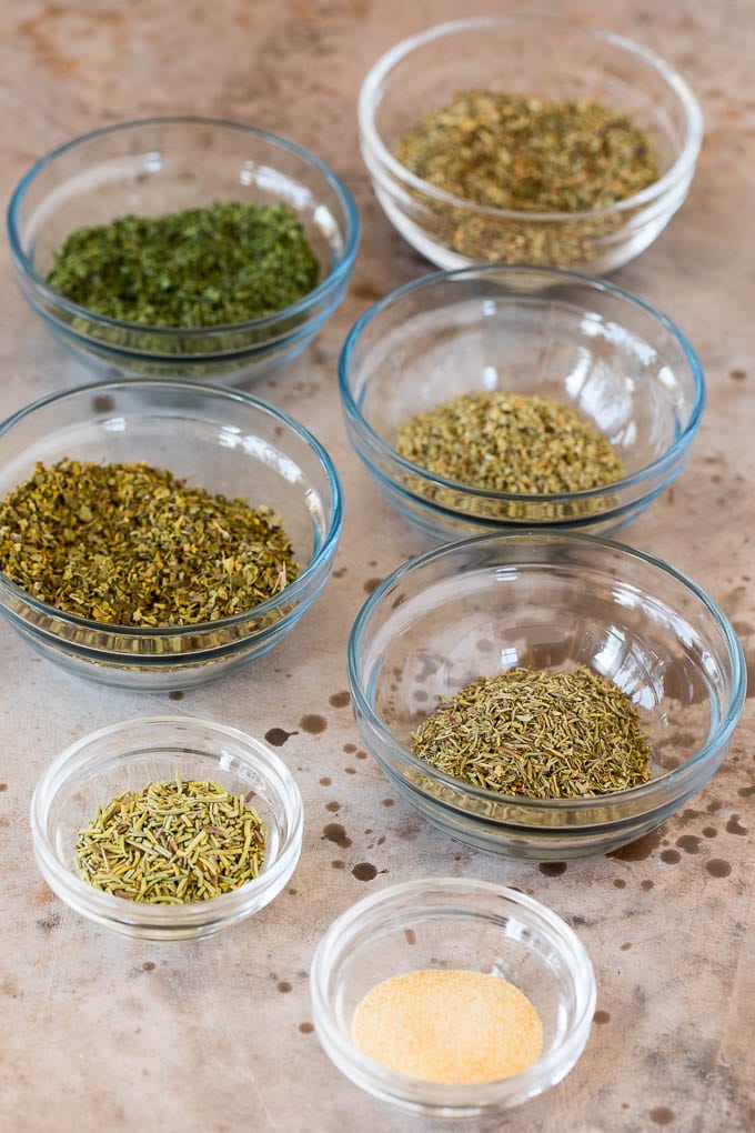 Small bowls of various herbs and spices.