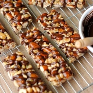 An image of several granola bars on a wire rack.