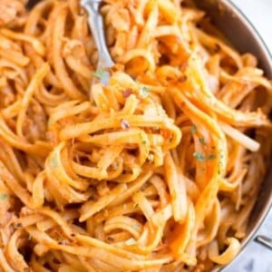 An image of a pot with slow cooker firecracker chicken pasta.