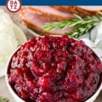This Instant Pot cranberry sauce is a blend of fresh cranberries, sugar, orange and spices, all simmered together in a pressure cooker to make a sweet and tangy condiment.